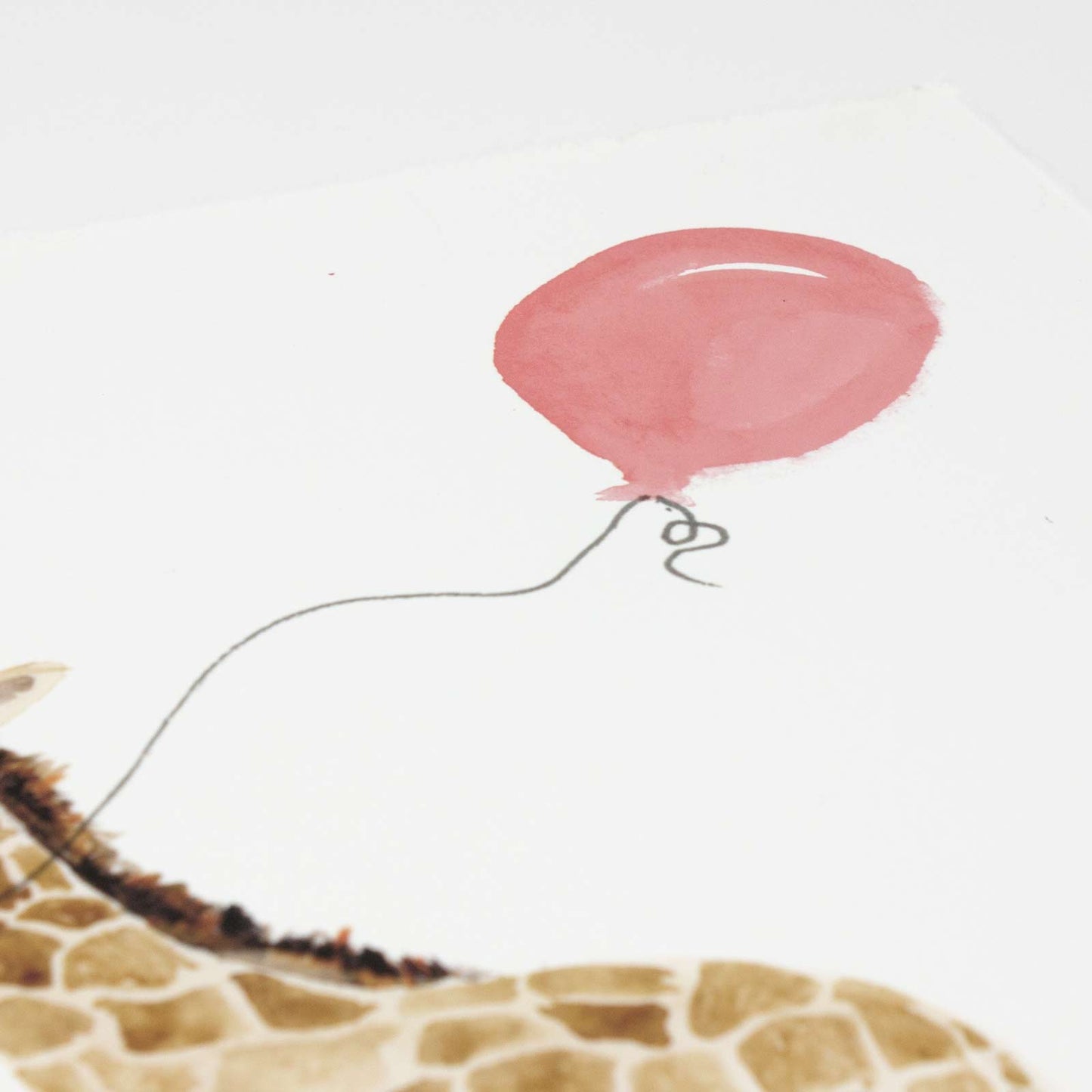 Baby Giraffe with Balloon